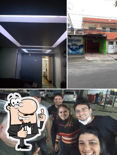 Look at the photo of Pizzaria do Tião