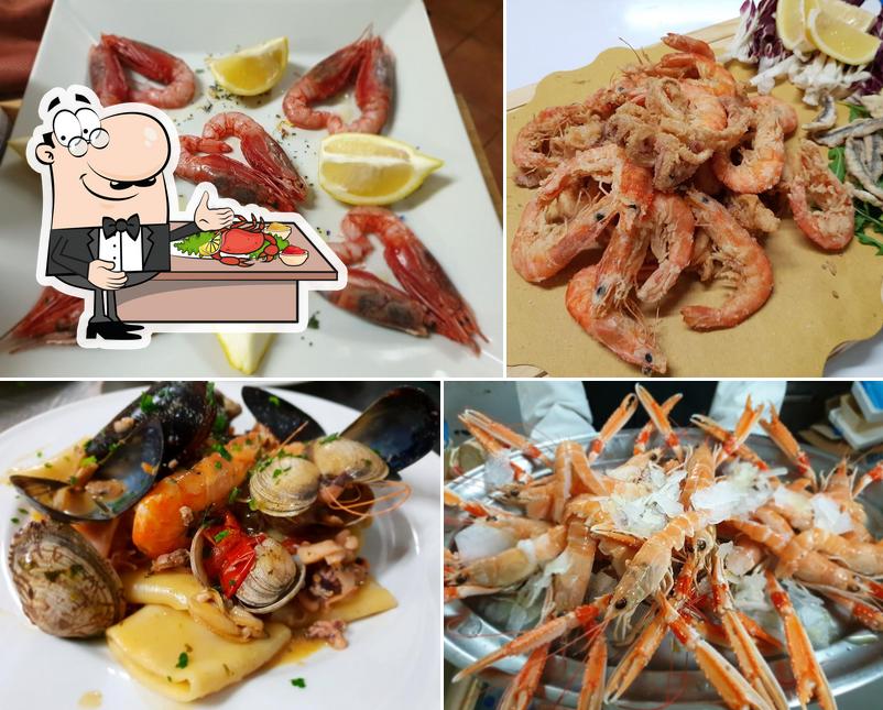 Choisissez différents plats à base de fruits de mer servis par LA TERRAZZA alla Marmorata