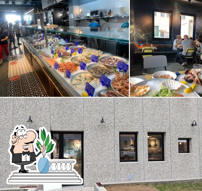 La immagine della esterno e tavolo da pranzo di La Pescheria da Claudio e Giuliano