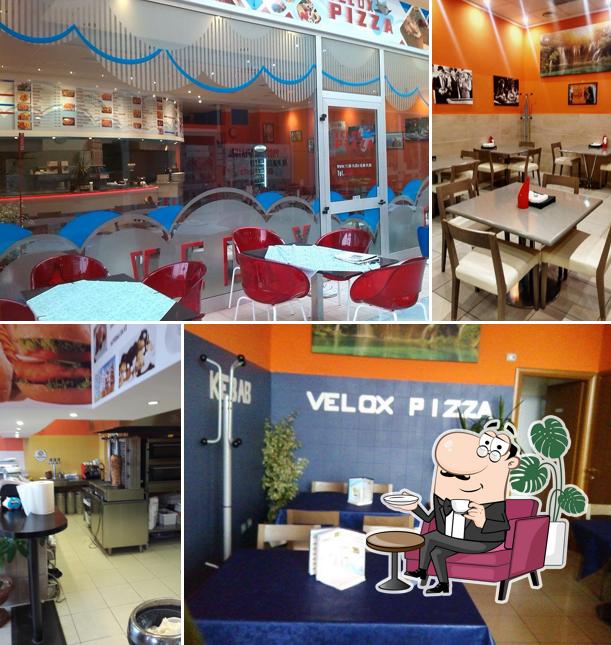 Siediti a un tavolo di Velox Pizza