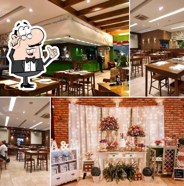 O interior do Pizzaria Casa Rapach