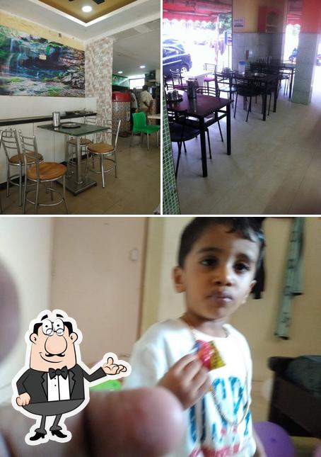 Take a look at the image showing interior and cake at Sirichandana Parlour(Special)