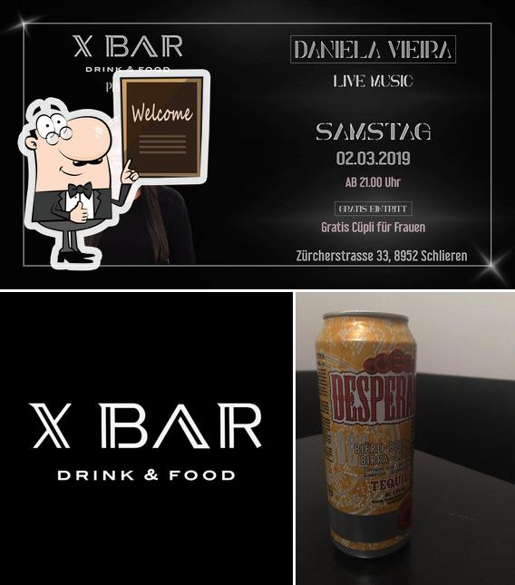 Это снимок паба и бара "X Bar Drink & Food"