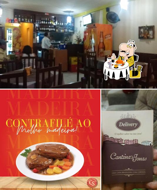 Dê uma olhada a foto apresentando comida e interior a Restaurante Cantina