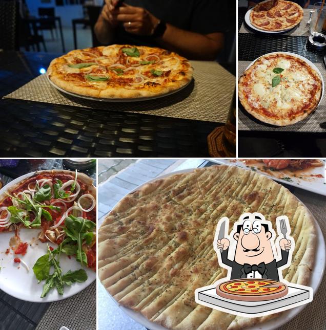 Pick pizza at La Dolce Vita Italian restaurant