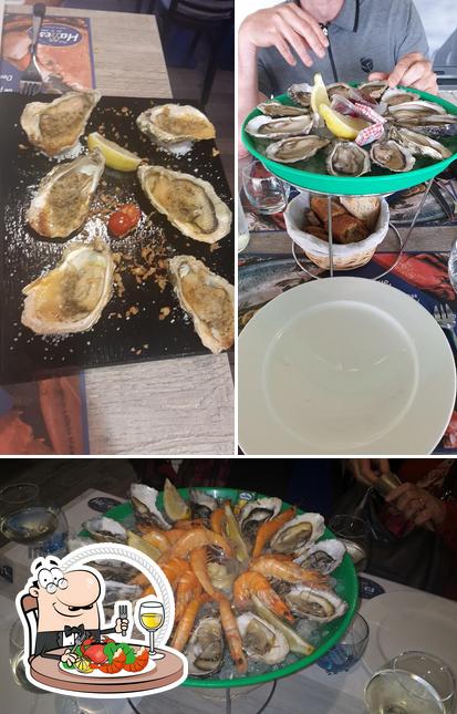 Попробуйте блюда с морепродуктами в "Aux Halles de la Mer"