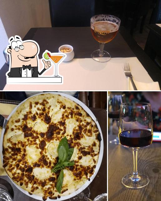 The picture of Restaurant Caliente’s drink and pizza