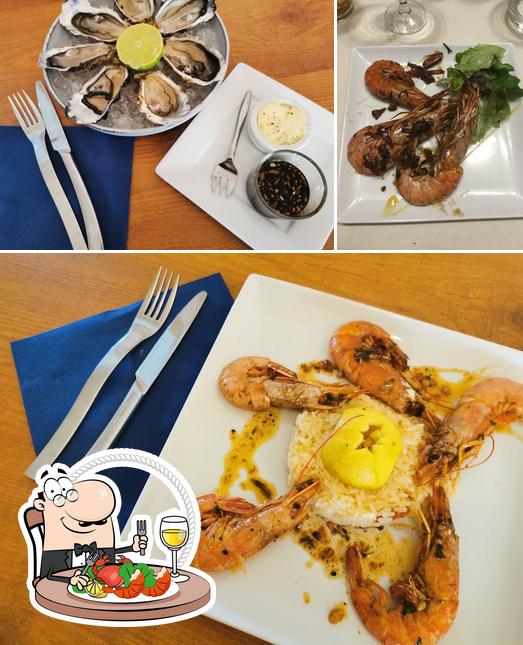 Try out seafood at La Parenthèse - Bar/Restaurant/Pizzeria