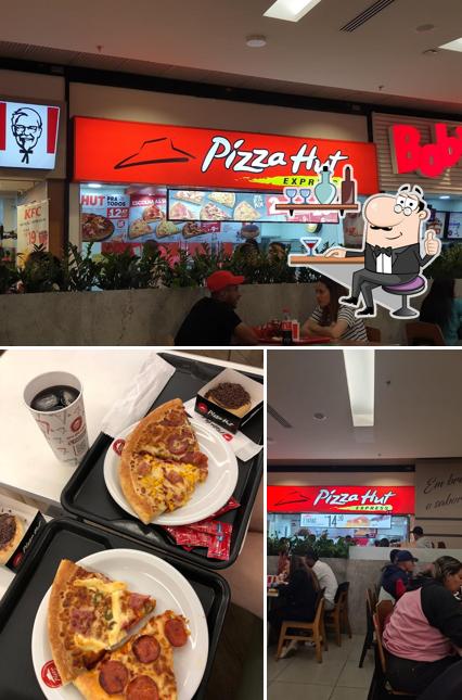 Dê uma olhada a ilustração ilustrando interior e pizza no Pizza Hut Express Shopping Metrô Tatuapé