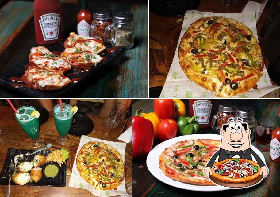 Get pizza at Unplugged Cafe And Bar