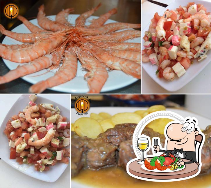 Try out seafood at Bar restaurante La Copita de Vino