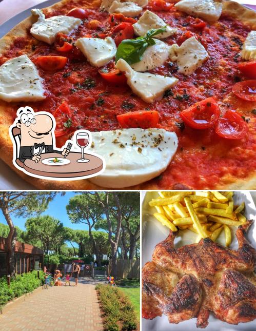 Questa è la immagine che raffigura la cibo e esterno di Kiki Restaurant