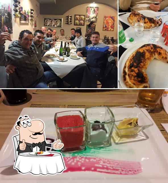 Dai un’occhiata alla foto che raffigura la tavolo da pranzo e esterno di Ristorante Pizzeria Marilyn