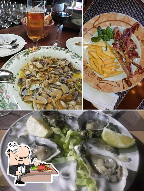 Попробуйте блюда с морепродуктами в "Bar restaurante El Aguador Condequinto"