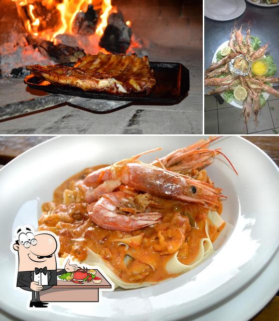 Try out seafood at Enzo Pizzeria Trattoria