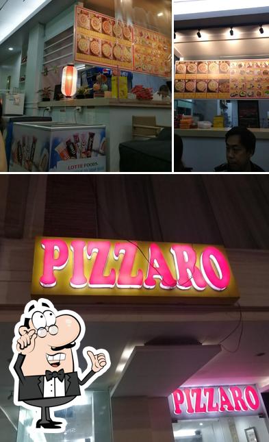 This is the picture showing interior and exterior at Pizzaro Pizza Lacson