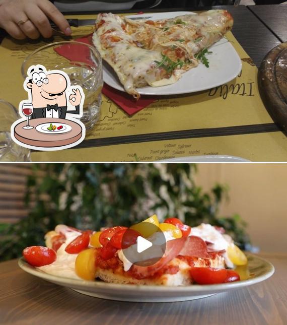 Platti al Karma pizza al trancio con forno a legna