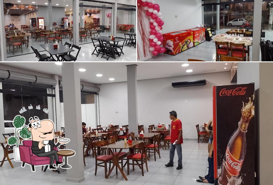 O interior do Pizzaria e Lanchonete Royal