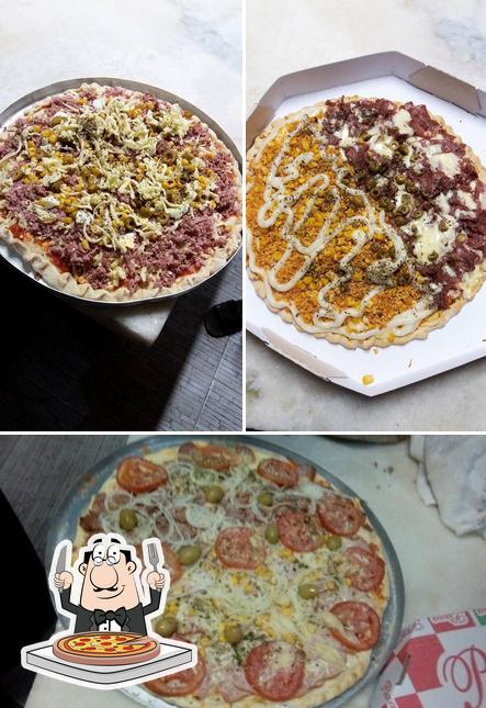 Escolha pizza no Pizzaria A Toca pizzas/salgados