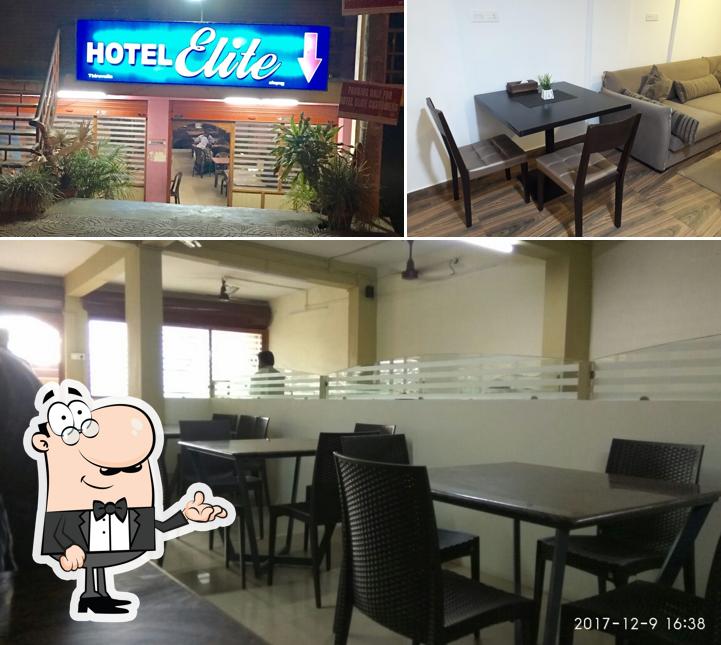 Take a seat at one of the tables at Hotel Elite
