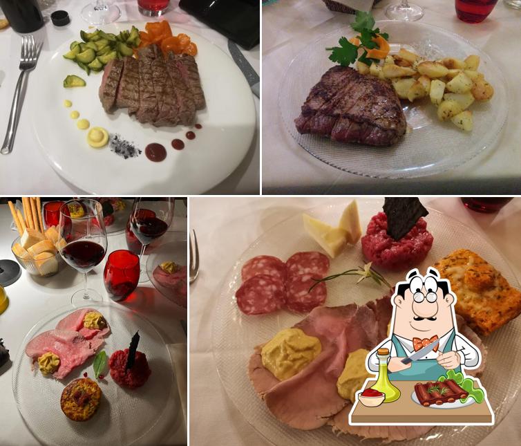 Prenditi i un pasto a base di carne a Ristorante Con Camere Cortiletto D'Alba