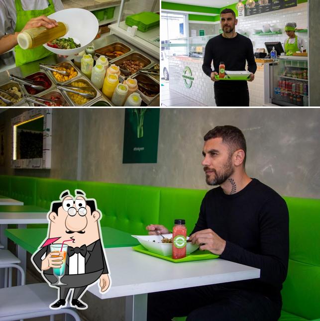A ilustração a Green Station Pindamonhangaba’s bebida e interior