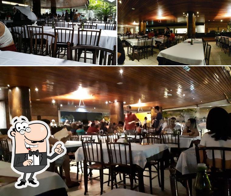 Sente em uma das mesas no Donna Margherita Pizzaria - unidade Carandaí