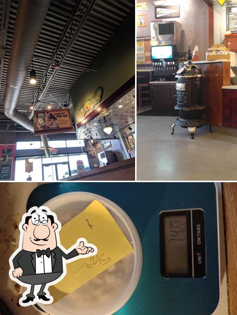 This is the image displaying interior and beverage at Potbelly