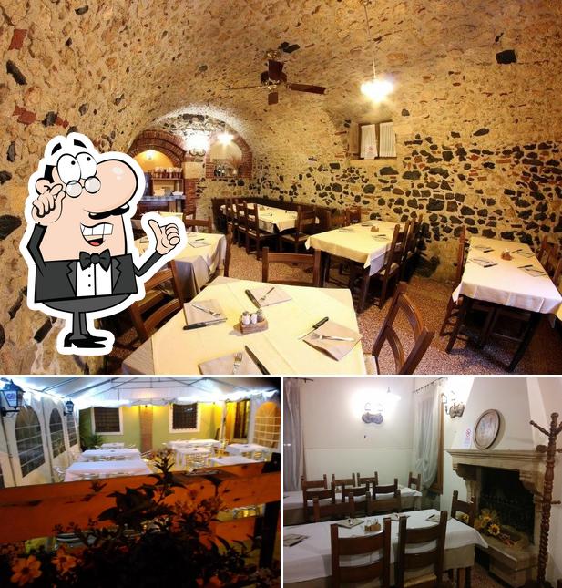 Siediti a un tavolo di Trattoria - Pizzeria Al Campanile