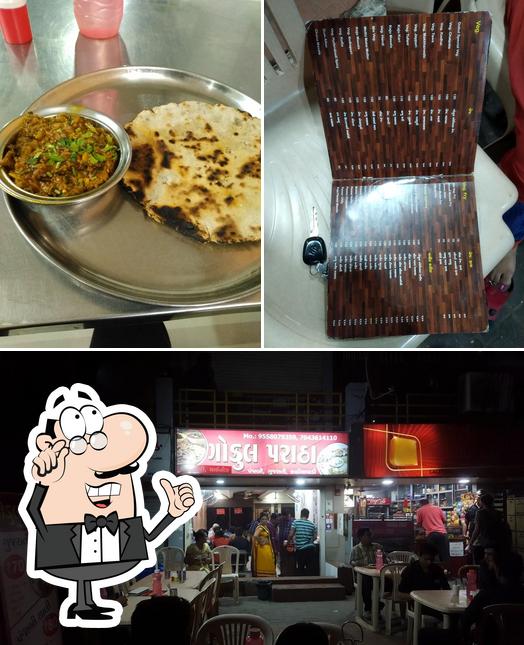Check out the photo depicting interior and food at Gokul Paratha house