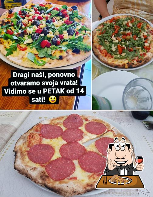 Pick pizza at Pizzeria Grimani