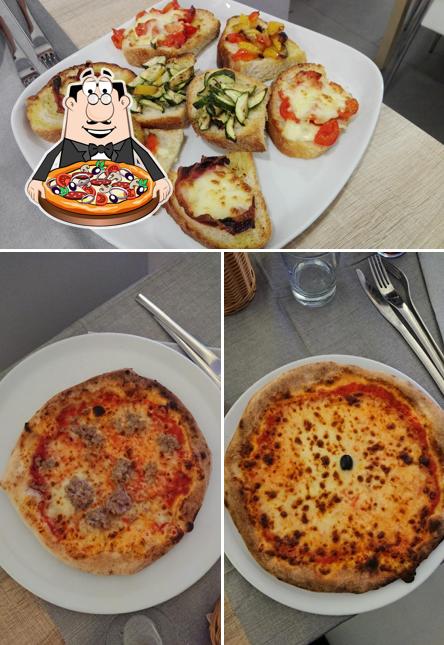 Scegli una pizza a "New planet" pizzeria sala compleanni con gonfiabili