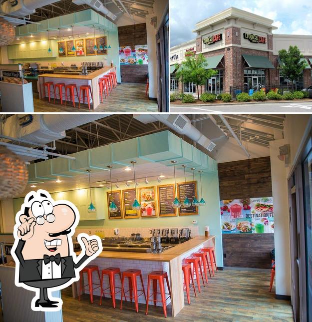 Check out the picture displaying interior and exterior at Tropical Smoothie Cafe
