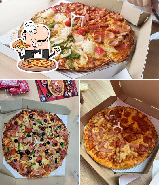 Отведайте пиццу в "Domino’s Pizza Ngamwongwan"