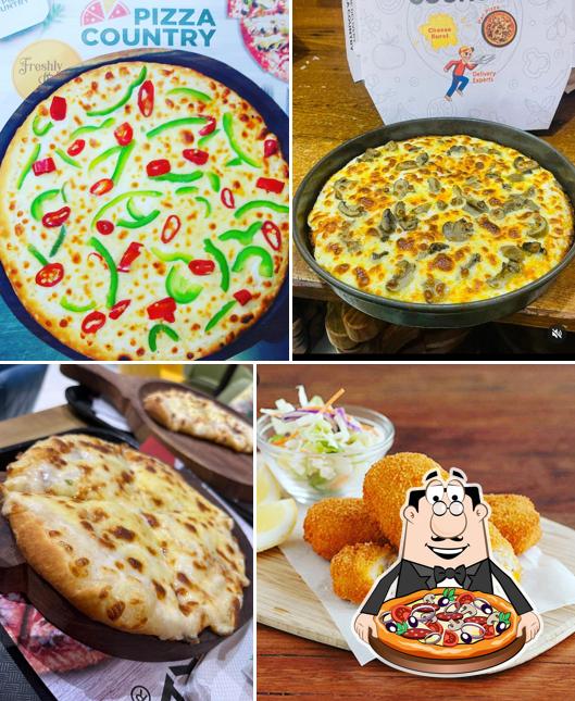 Try out pizza at PIZZA COUNTRY