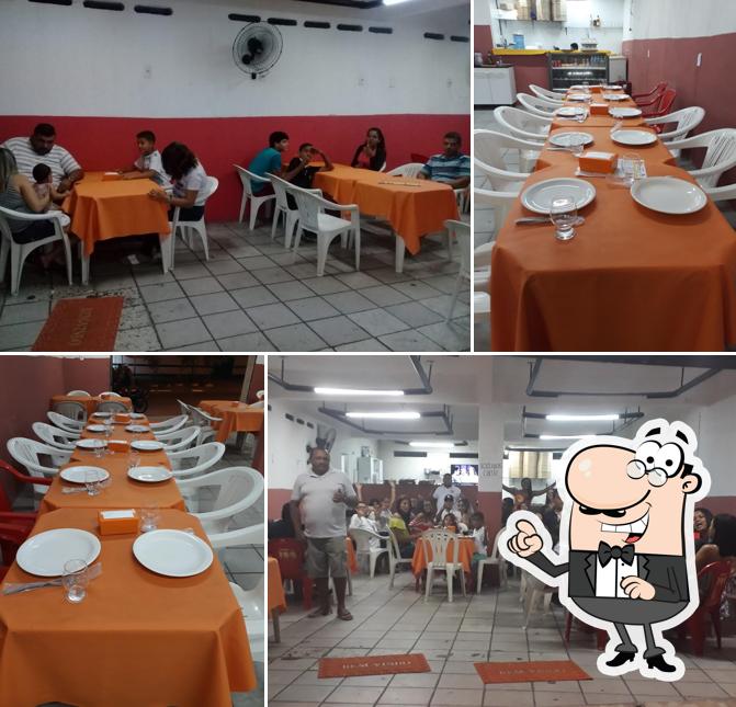 O interior do CG Pizzaria & Lanchonete