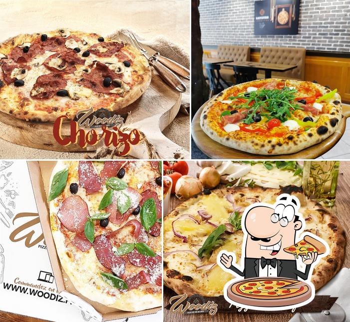 A Woodiz beaumont ( emporter / livraison ou sur place) ), vous pouvez prendre des pizzas