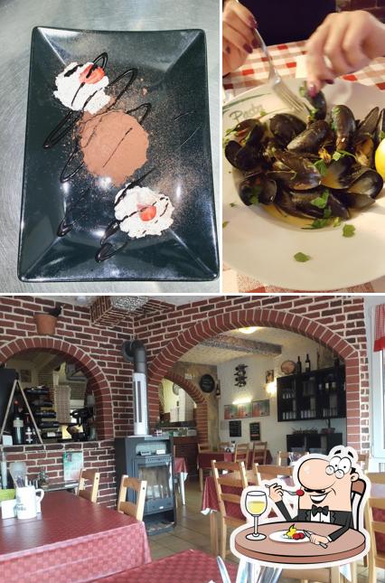 Voici la photo représentant la nourriture et intérieur sur Enzo's Pizza Rusticale
