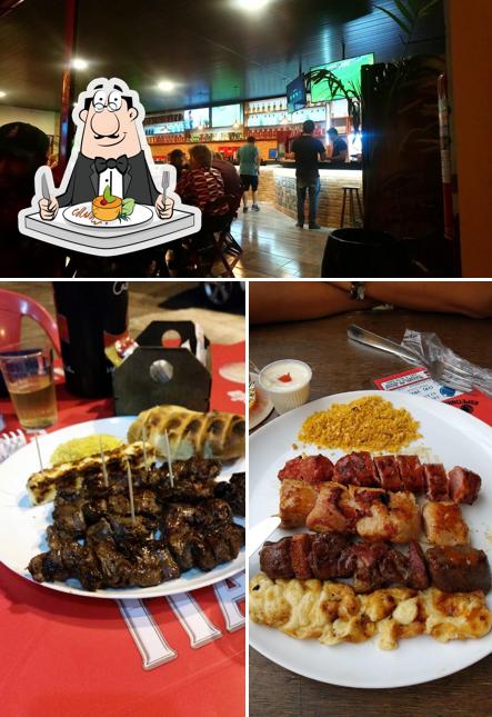 A ilustração da comida e balcão de bar no Espetinho do Alemão