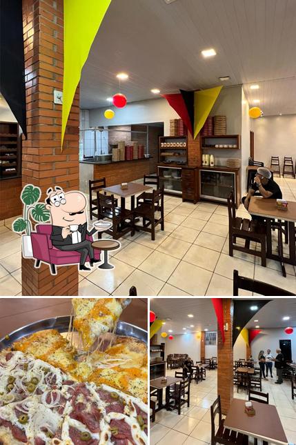 O interior do Pizzaria e Petiscaria Amigos.com St.Sudoeste