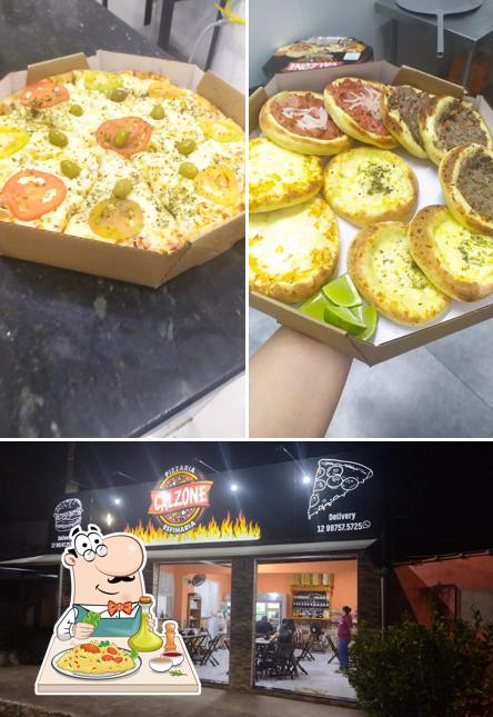 Confira a foto mostrando comida e interior no Pizzaria e Esfiharia Calzone