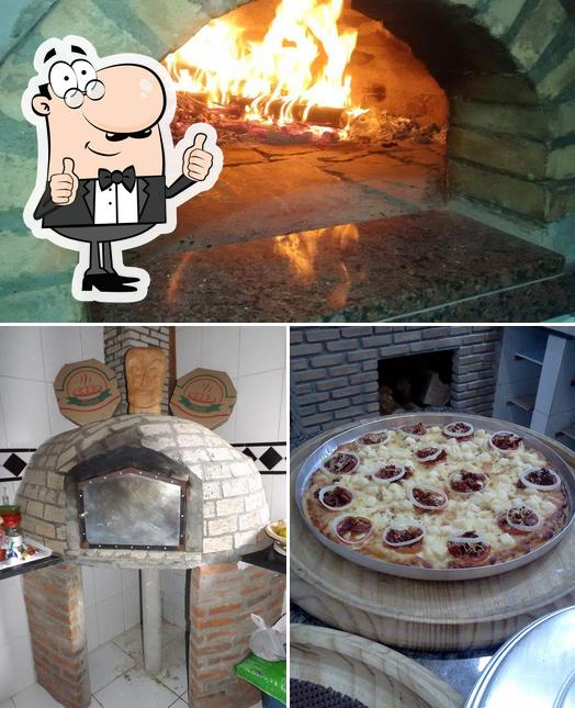 See this pic of Herold's Delivery de Pizzas em Forno a Lenha