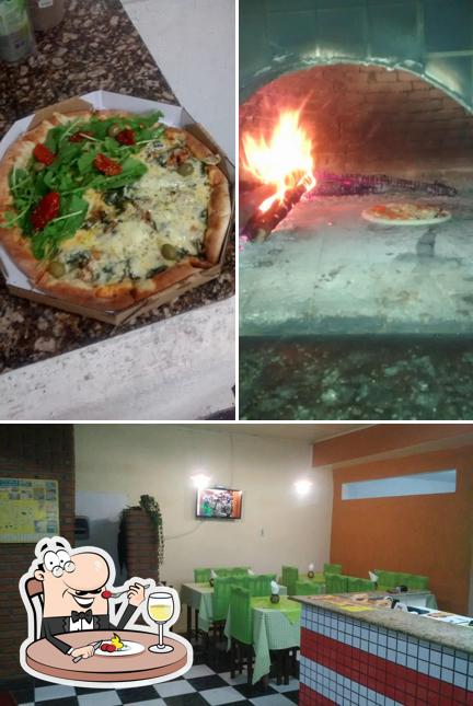 A foto do Pizzaria JV’s comida e interior