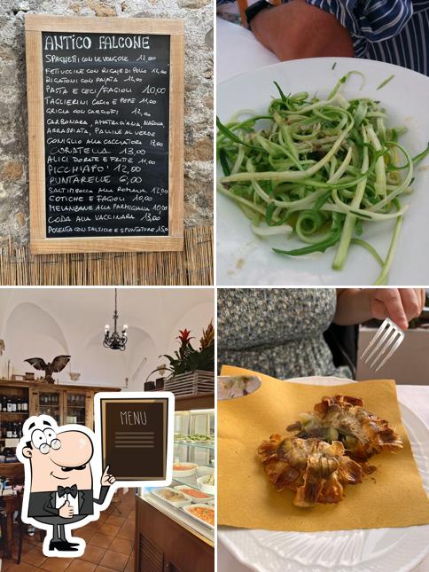 Trattoria Antico Falcone offre il menu scritto su una lavagna