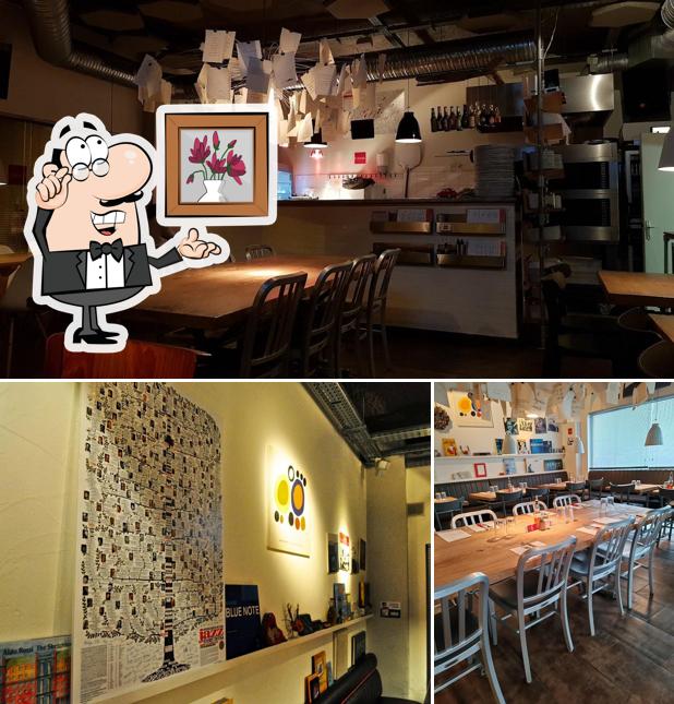 Installez-vous à l'une des tables de Cristina Pâtes et Pizza