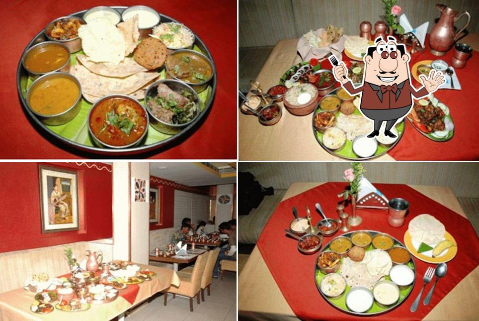 Check out the image depicting food and interior at Dhakshini