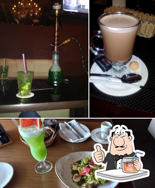 Фотография, на которой видны напитки и еда в Женева