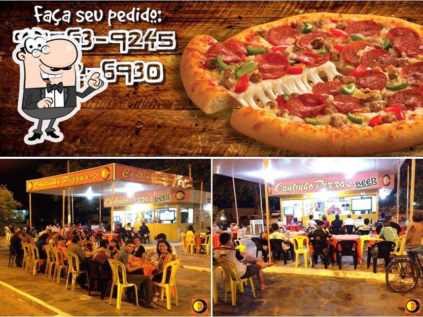 A ilustração da interior e pizza a Cantinho Pizzaria & Hamburgueria