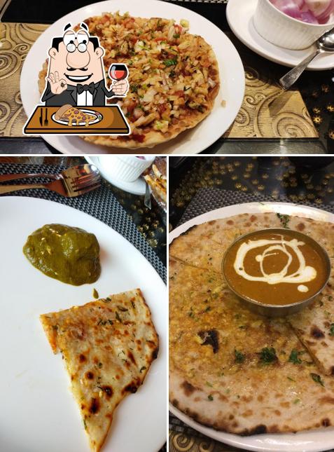 Get pizza at Punjabi Rasoi