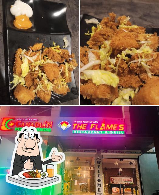 The Flames Restaurant & Grill-Best Fine Dine Restaurant/Gym Special Diet/Chinese/Family/Veg&Non Veg Restaurant in Tarn Taran is distinguished by food and exterior